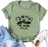 Les femmes le mercredi, nous portons un t-shirt noir pour Halloween
