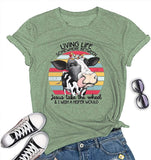 Living Life Somewhere Between Jesus Take The Wheel and Wish a Heifer Would T-Shirt Cow Shirt for Women