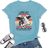 Living Life Somewhere Between Jesus Take The Wheel and Wish a Heifer Would T-Shirt Cow Shirt for Women