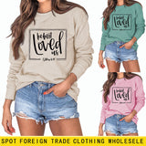 Er liebte uns zuerst, Base-Schriftzug, langärmeliger großer Pullover für Damen