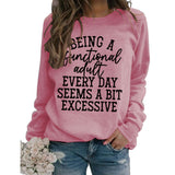 Ein funktionelles Rundhalsoberteil mit langen Ärmeln und lockerem Sweatshirt