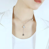 Chaîne en morceaux avec pendentif papillon tridimensionnel et collier de perles avec chaîne de clavicule assortie