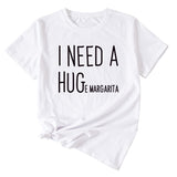 MINIMALISTISCHES T-SHIRT MIT RUNDHALSAUSSCHRIFTZUG „I NEED A HUG“ MIT KURZEN ÄRMELN