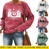 Lockerer Pullover mit Rundhalsausschnitt und langen Ärmeln und „Don’t Be Negative“-Aufdruck