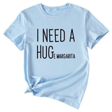 MINIMALISTISCHES T-SHIRT MIT RUNDHALSAUSSCHRIFTZUG „I NEED A HUG“ MIT KURZEN ÄRMELN