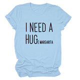MINIMALISTISCHES T-SHIRT MIT RUNDHALSAUSSCHRIFTZUG „I NEED A HUG“ MIT KURZEN ÄRMELN