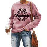 Haut à col rond AVERTISSEMENT ! Le sweat ample imprimé