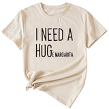 MINIMALISTISCHES T-SHIRT MIT RUNDHALSAUSSCHRIFTZUG „I NEED A HUG“ MIT KURZEN ÄRMELN