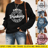 Haut à col rond AVERTISSEMENT ! Le sweat ample imprimé
