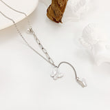 Chaîne en morceaux avec pendentif papillon tridimensionnel et collier de perles avec chaîne de clavicule assortie