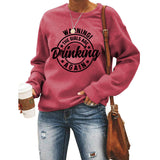 Haut à col rond AVERTISSEMENT ! Le sweat ample imprimé